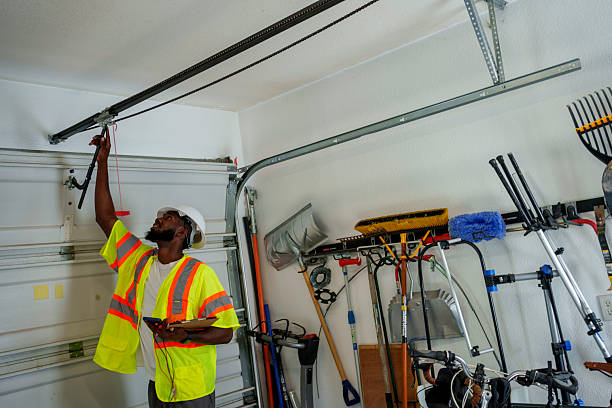 Professional Garage Door Maintenance technician working in Hartshorne, OK